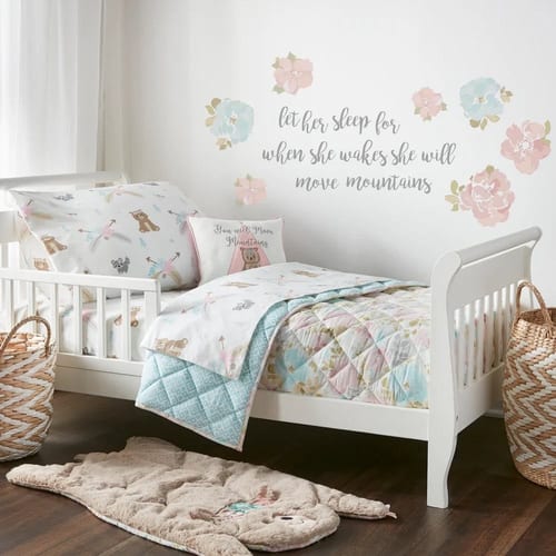 Newborn baby swaddled in soft blanket